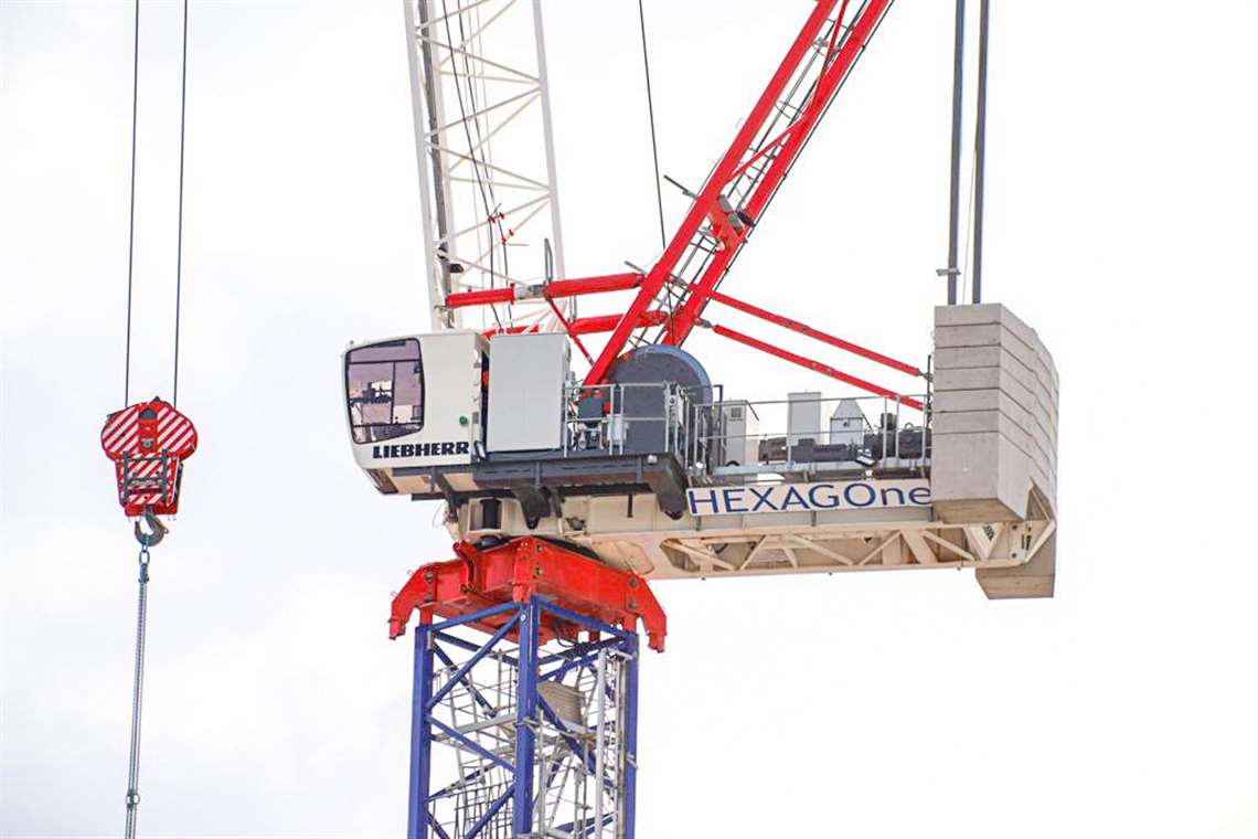 Liebherr luffing jib tower crane in the Red, white and blue livery of Hexagone Services