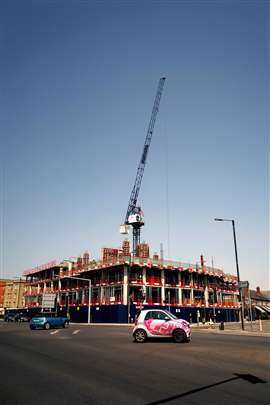 Jost JTL 108 luffing jib tower crane owned by Bennetts on a Feltham Construction site in the UK