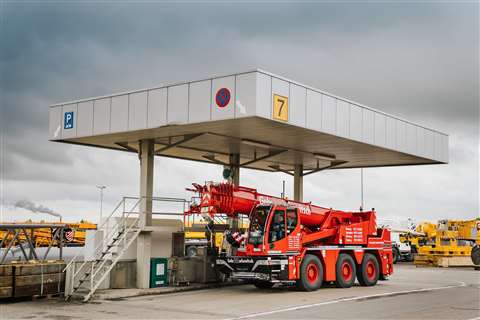 Filling a new wheeled mobile crane in red Markewitsch livery with HVO fuel at the Liebherr factory in Ehingen, Germany