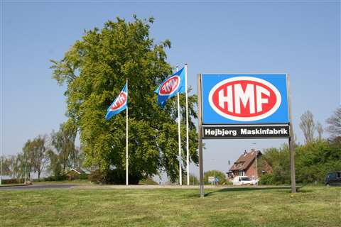 HMF logo sign in grass outside factory