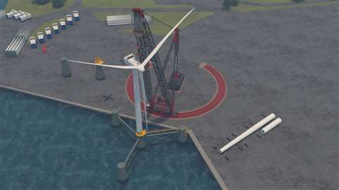 big lattice crane on quayside loading turbine bases