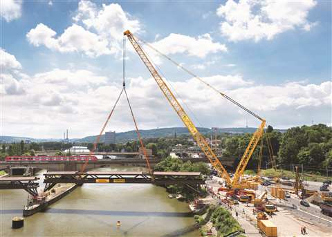 Wiesbauer’s Liebherr LG 1750 mobile lattice boom crane dismantling pedestrian bridge as part of the Stuttgart 21 rail project in Germany