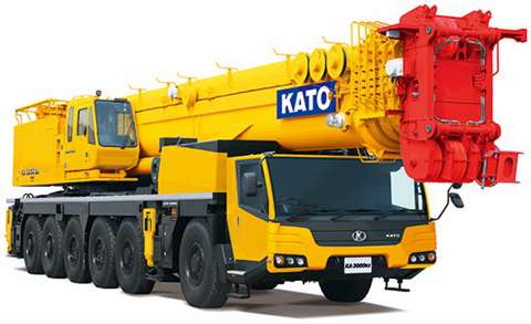 Yellow with a red boom head Kato KA-3000RX 300 tonne capacity all terrain crane on six axle carrier